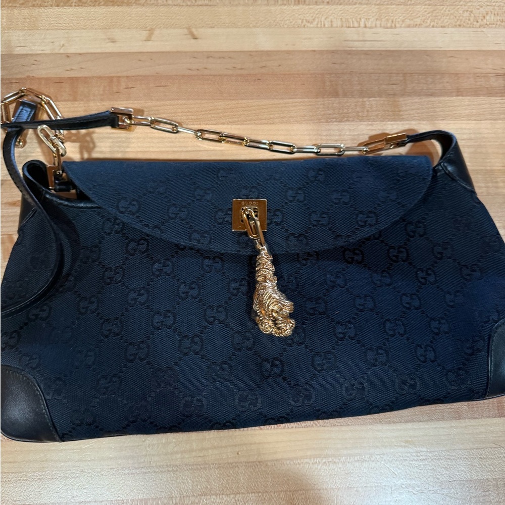 Gucci Black GG Monogram Shoulder Bag with Gold Tassel Charm